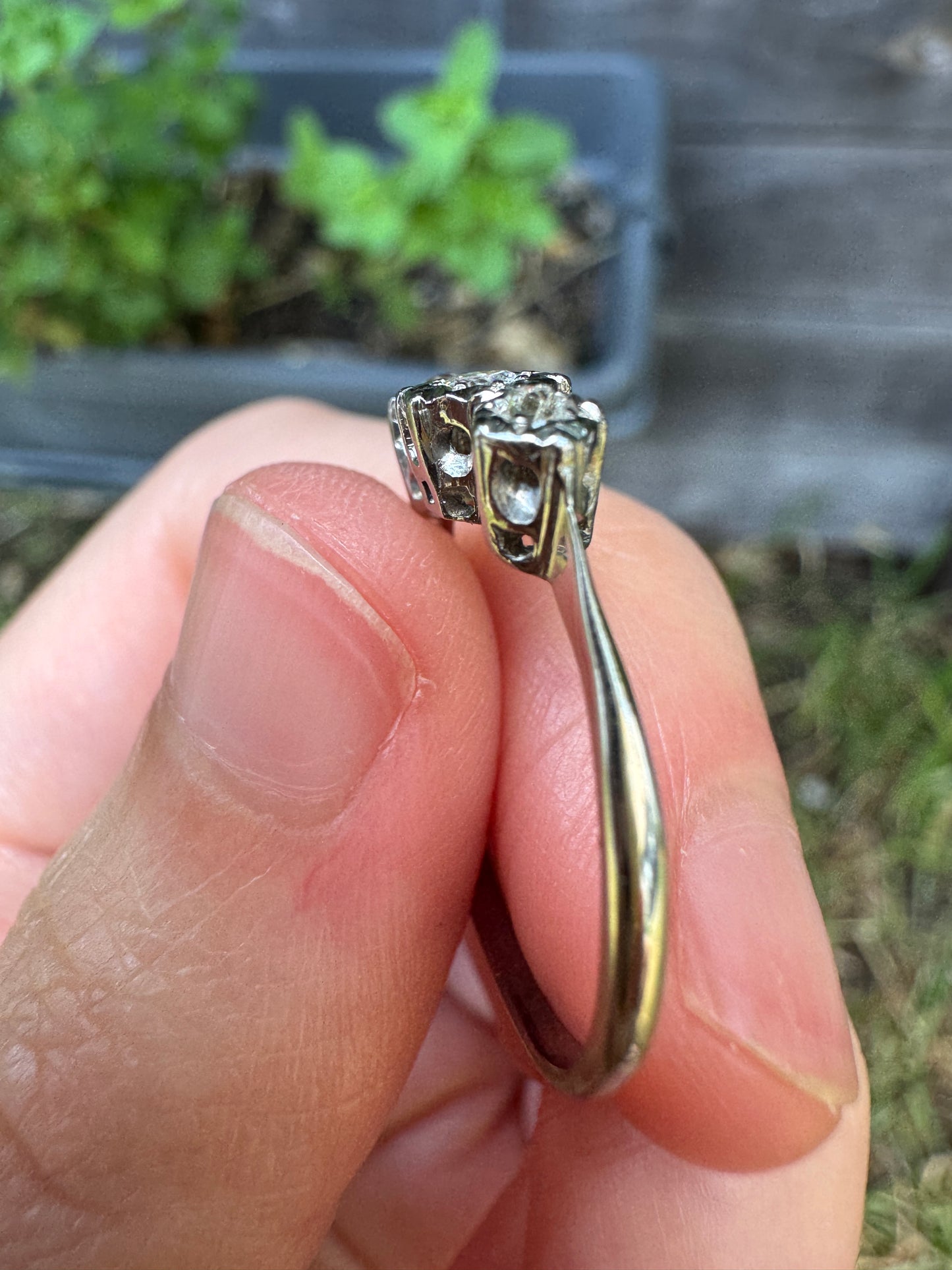 Vintage 18ct white gold and platinum three stone 0.16ct TCW old mine cut and old European cut diamond ring