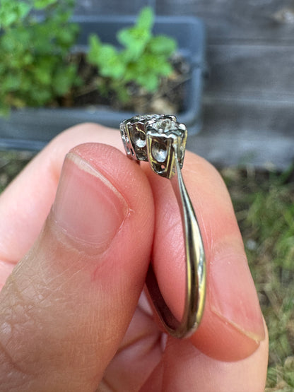 Vintage 18ct white gold and platinum three stone 0.16ct TCW old mine cut and old European cut diamond ring