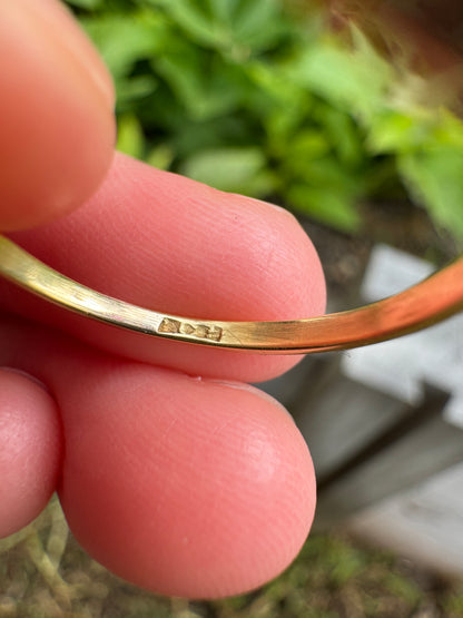 Vintage 18ct yellow gold ruby and diamond horseshoe ring