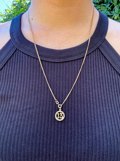 Vintage 9ct yellow gold '13' pendant