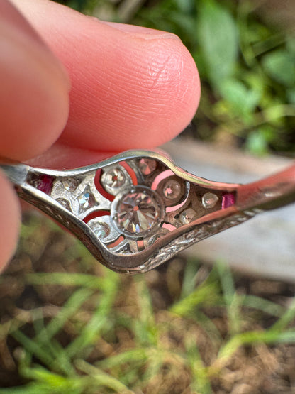Antique platinum 0.17ct old mine cut and 0.12ct TCW old single cut diamond ring with accent ruby cabochons