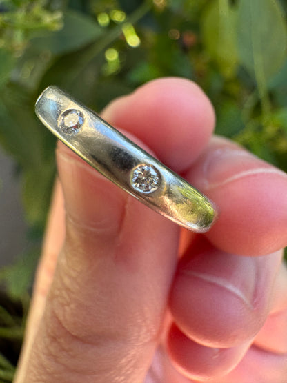 Vintage platinum three stone round brilliant cut diamond gypsy ring