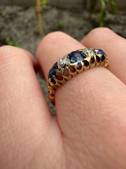 Antique 18ct yellow gold five stone 0.5ct TCW old cut natural sapphire and 0.38ct TCW old mine cut diamond ring