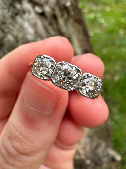 Vintage 18ct yellow gold three stone 0.6ct TCW old mine cut diamond bezel set ring