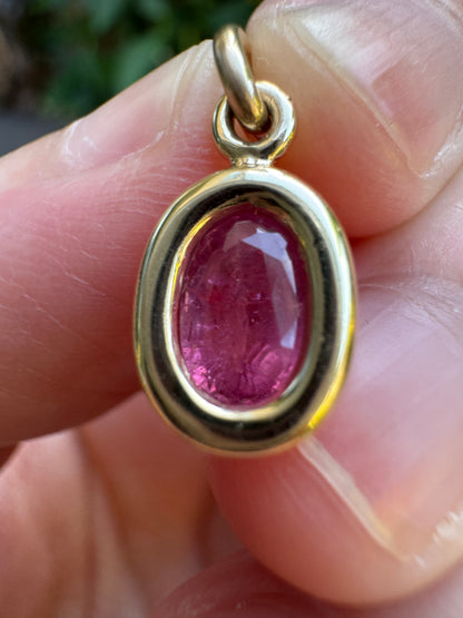 Custom 9ct yellow gold 0.8ct pink sapphire bezel set pendant