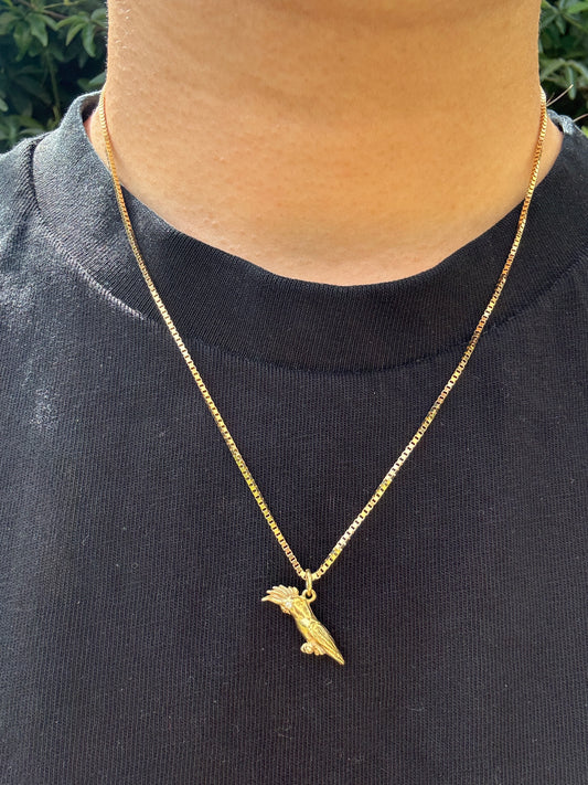 Vintage 18ct yellow gold cockatoo charm with single cut diamond eyes