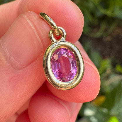 Custom handmade recycled 9ct yellow gold 0.93ct natural pink sapphire bezel set pendant