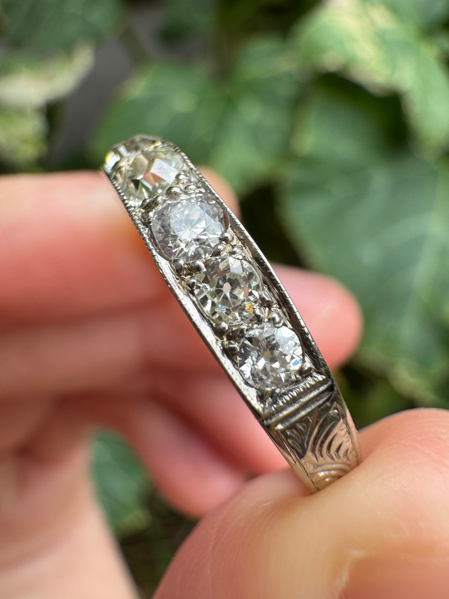 Vintage platinum 0.7ct TCW old mine cut diamond engraved half eternity ring