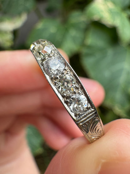Vintage platinum 0.7ct TCW old mine cut diamond engraved half eternity ring