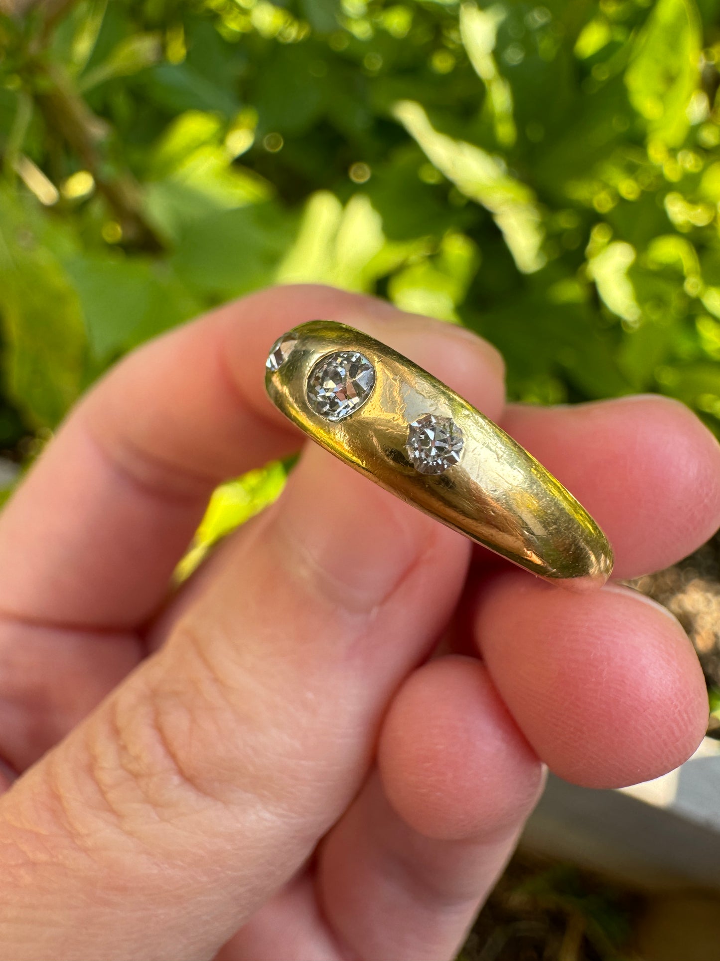 Vintage 18ct yellow gold 0.2ct TCW three stone old mine cut and single cut diamond gypsy ring