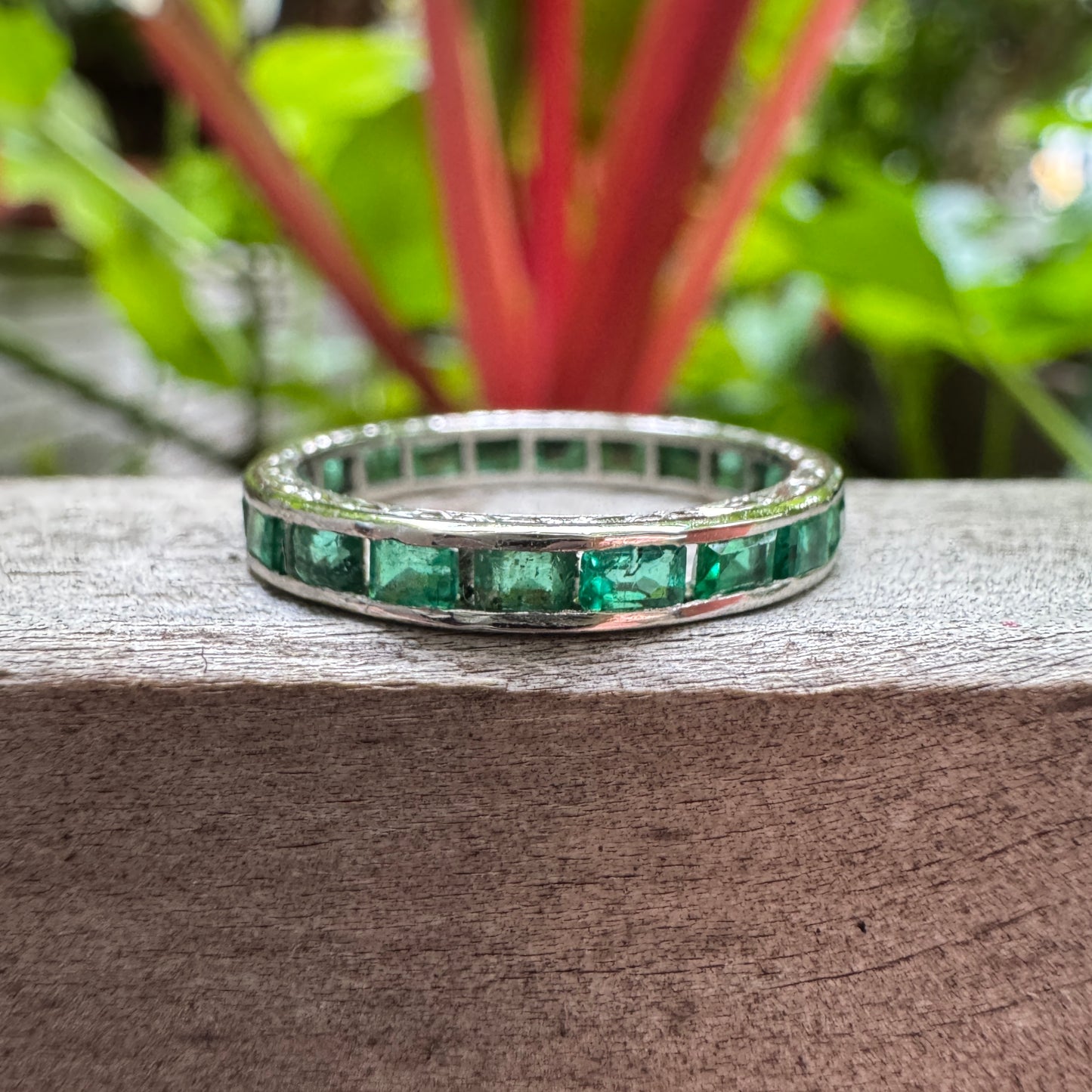 Antique platinum 1.02ct TCW natural emerald engraved eternity ring