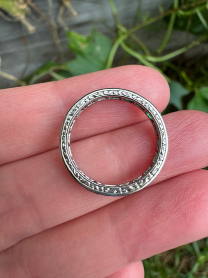 Antique platinum 1.02ct TCW natural emerald engraved eternity ring