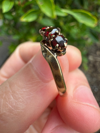 Antique Australian 18ct yellow gold three stone 0.46ct TCW garnet crossover ring