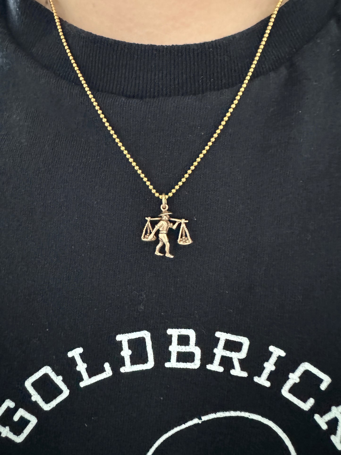 Vintage 9ct yellow gold farmer charm