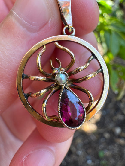 Antique 9ct yellow gold 0.6ct garnet and pearl spider pendant