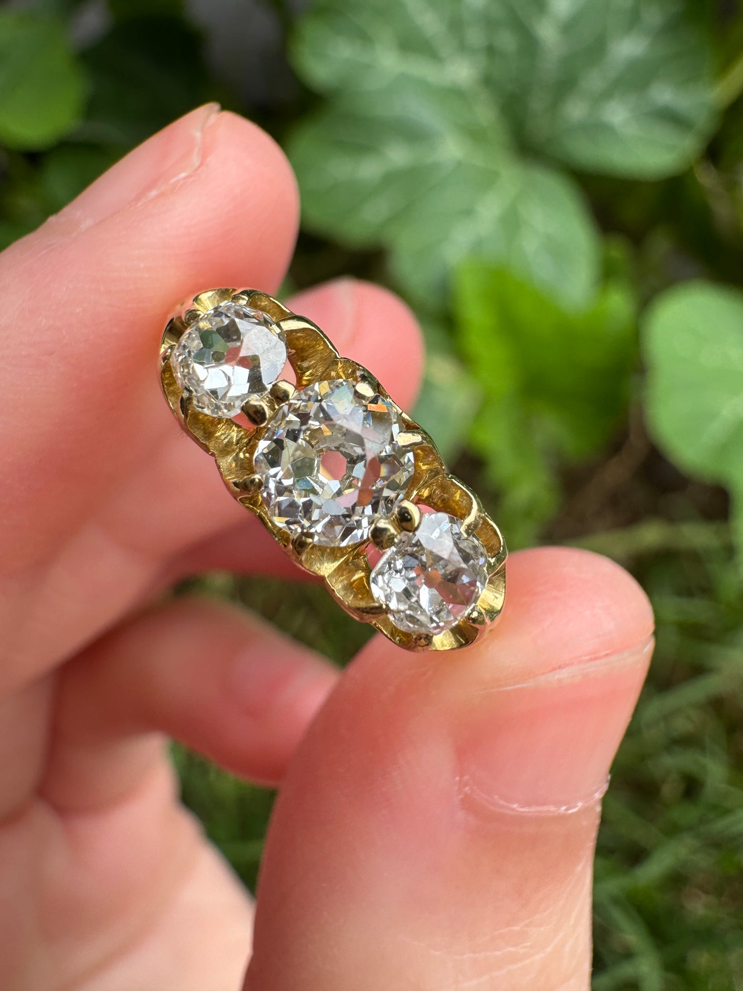 Antique 18ct yellow gold three stone 1.07ct TCW old mine cut diamond belcher ring