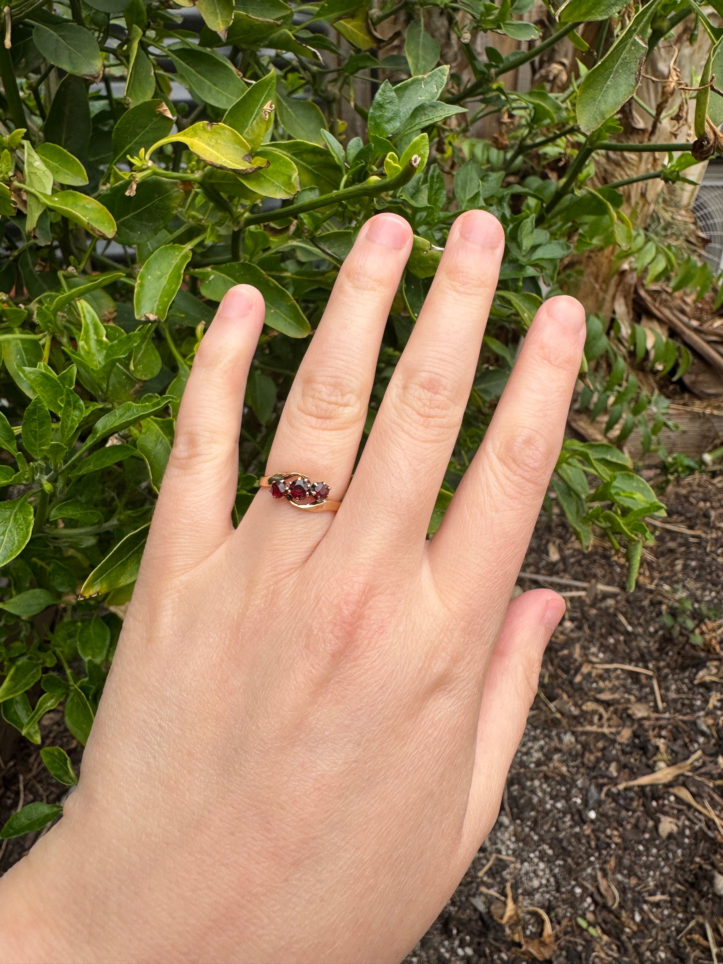 Antique Australian 18ct yellow gold three stone 0.46ct TCW garnet crossover ring