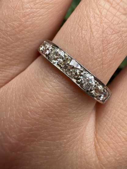 Vintage platinum 0.7ct TCW old mine cut diamond engraved half eternity ring