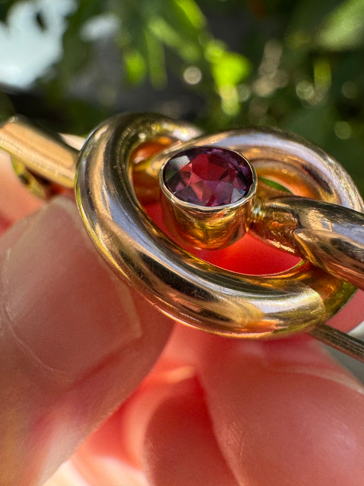 Antique 9ct rosy yellow gold 0.52ct garnet love knot brooch/chain extender