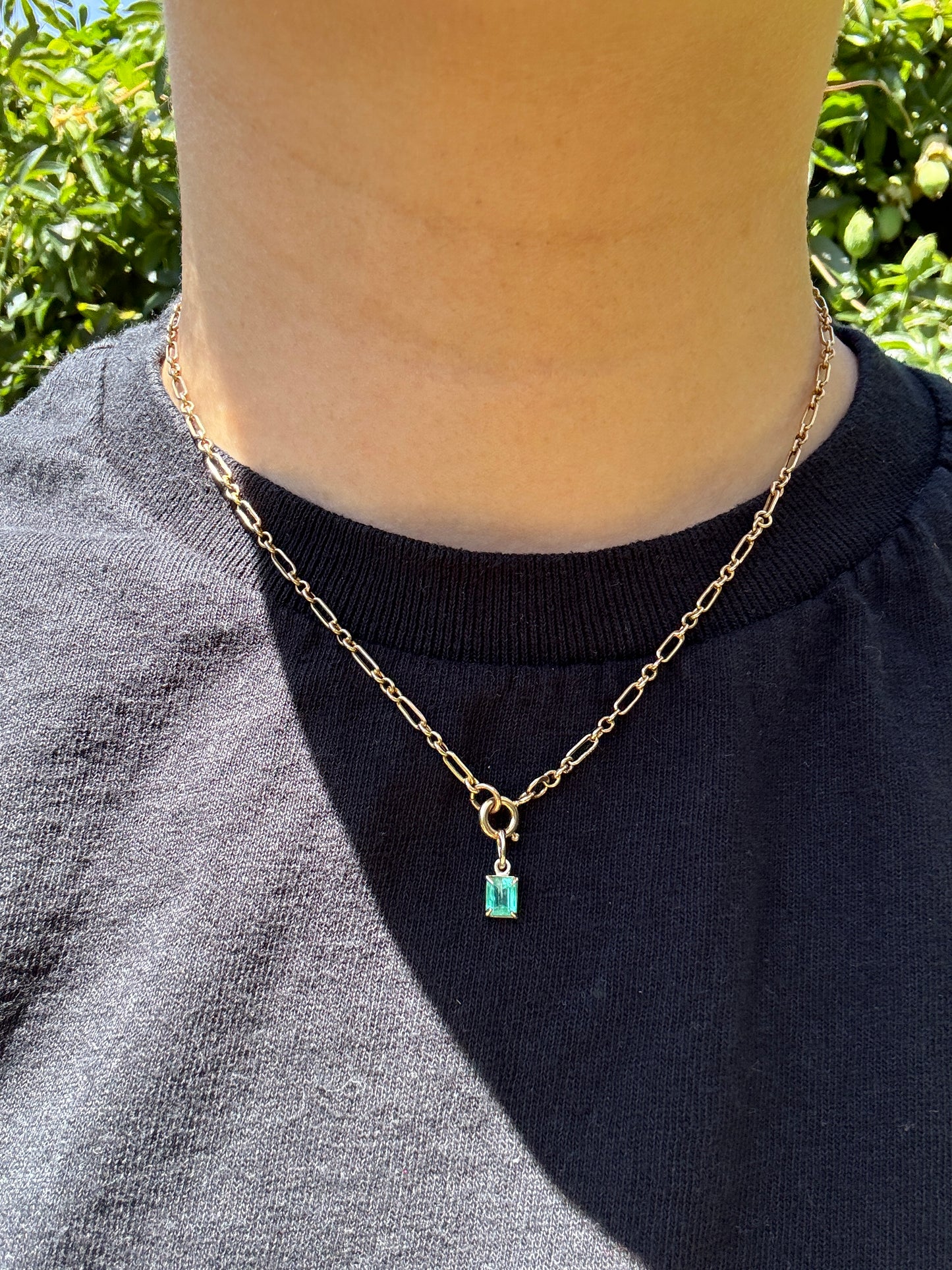 Custom 9ct yellow gold 0.56ct emerald claw set pendant