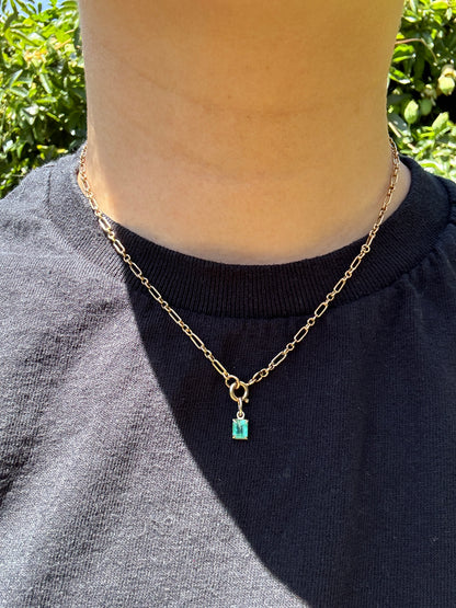 Custom 9ct yellow gold 0.56ct emerald claw set pendant