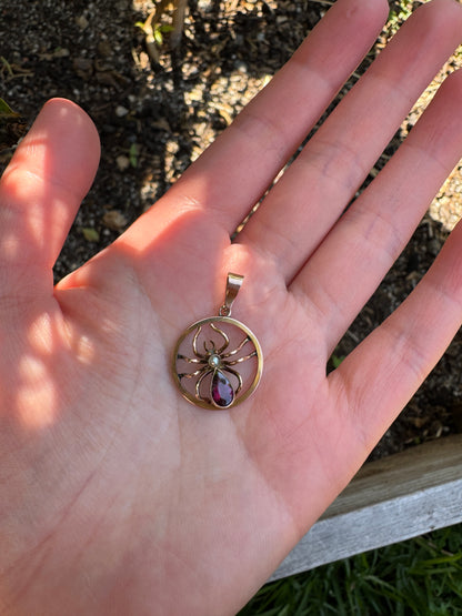 Antique 9ct yellow gold 0.6ct garnet and pearl spider pendant