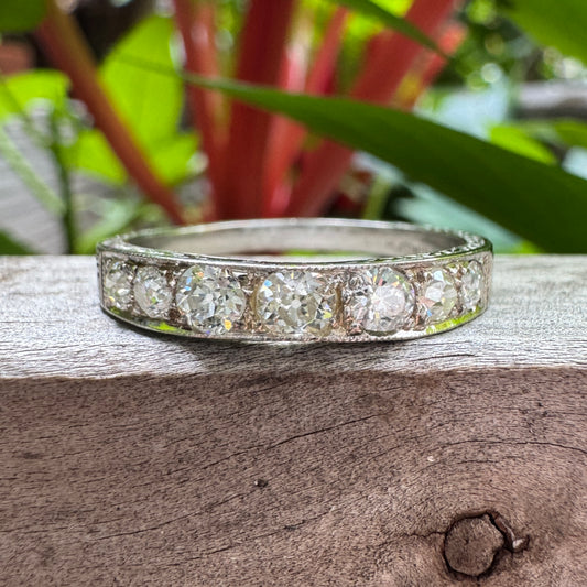Vintage platinum 0.7ct TCW old mine cut diamond engraved half eternity ring