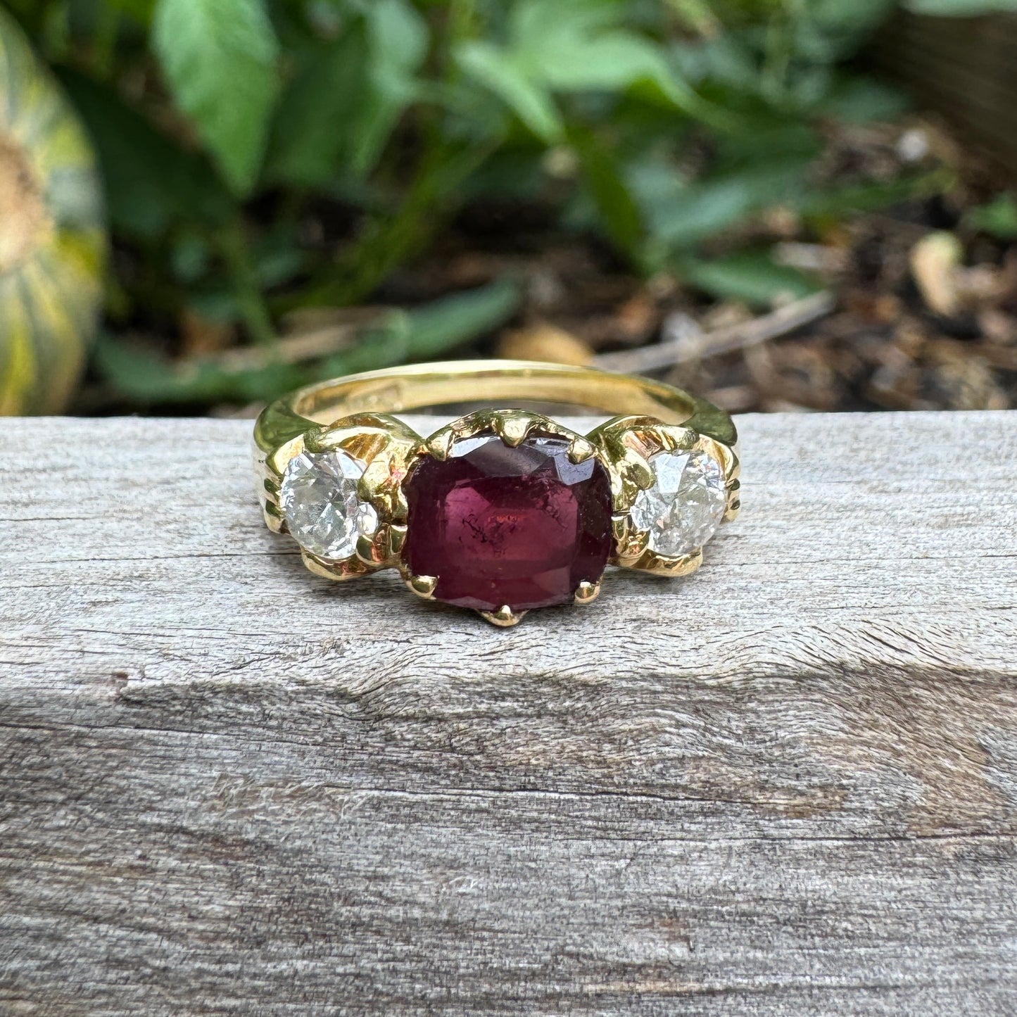 Antique 18ct yellow gold three stone 0.95ct flat cut garnet and 0.45ct TCW old European cut diamond ring