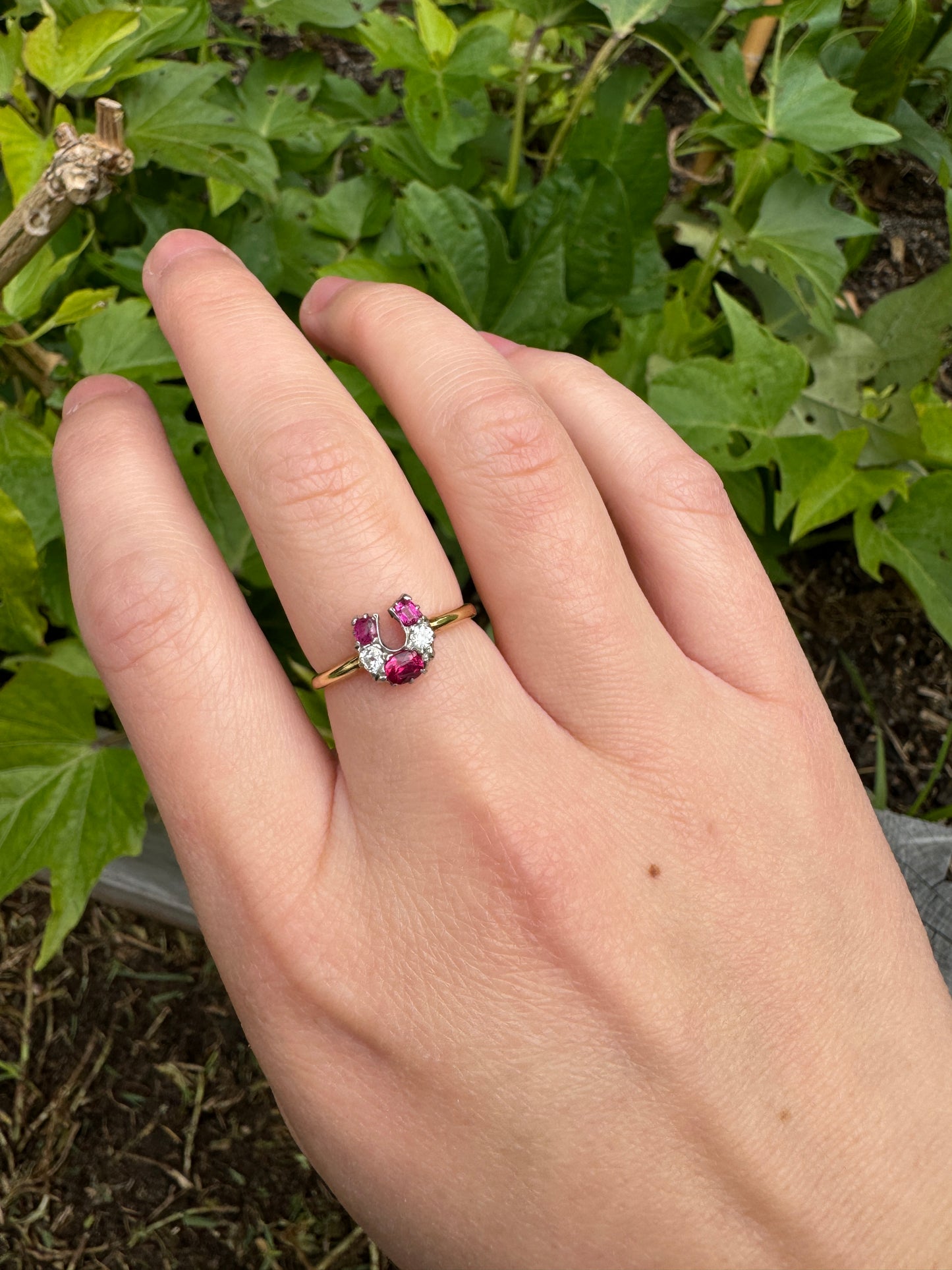 Vintage 18ct yellow gold ruby and diamond horseshoe ring
