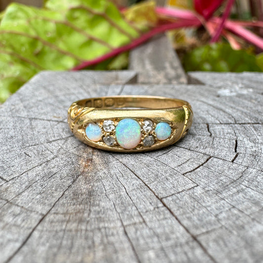 Vintage 18ct yellow gold opal and old cut diamond boat ring