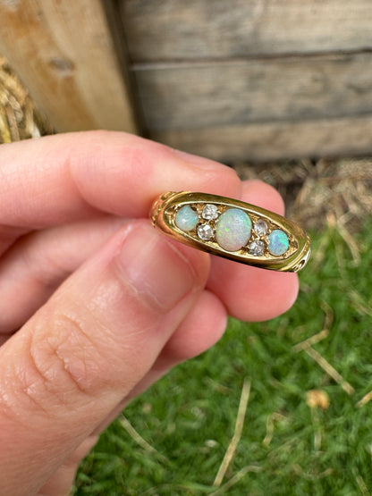 Vintage 18ct yellow gold opal and old cut diamond boat ring