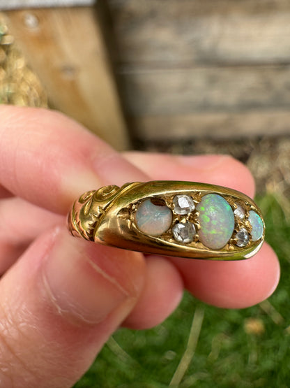 Vintage 18ct yellow gold opal and old cut diamond boat ring
