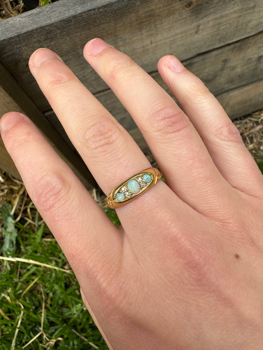 Vintage 18ct yellow gold opal and old cut diamond boat ring