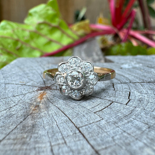Vintage 18ct yellow gold and platinum 0.36ct TCW mixed old cut diamond daisy ring