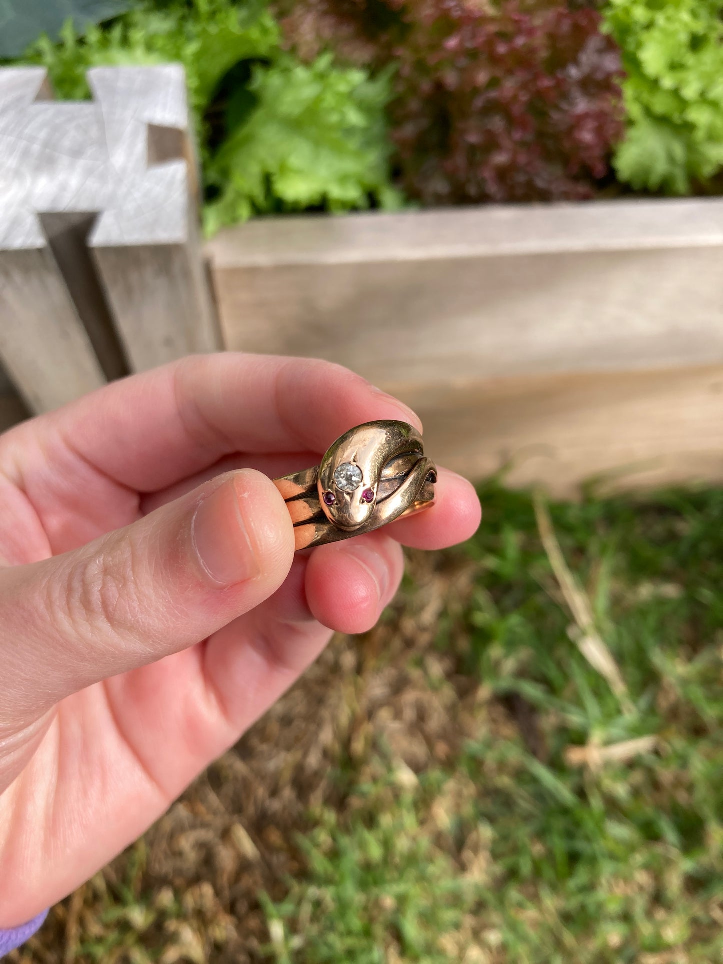 Antique 9ct rose gold old cut diamond and ruby cabochon snake ring