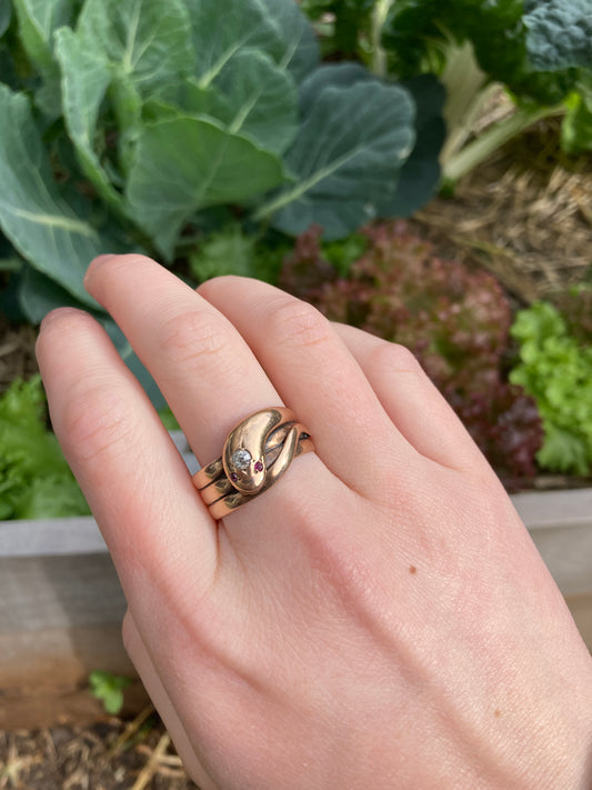 Antique 9ct rose gold old cut diamond and ruby cabochon snake ring
