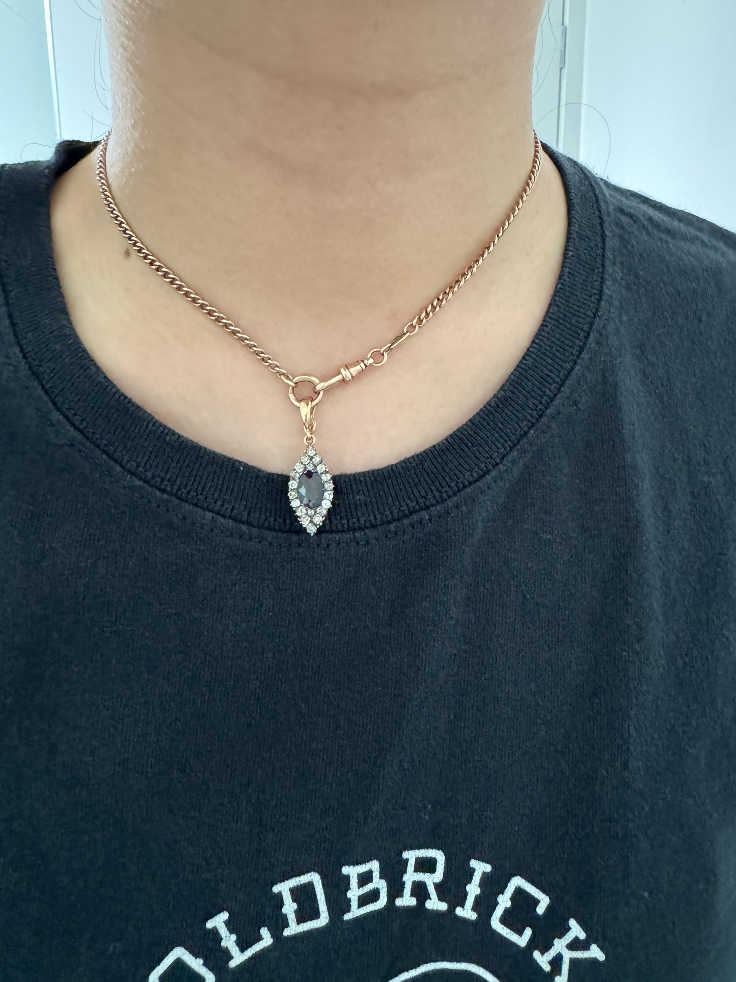 Vintage 9ct yellow gold oval garnet and old cut diamond pendant