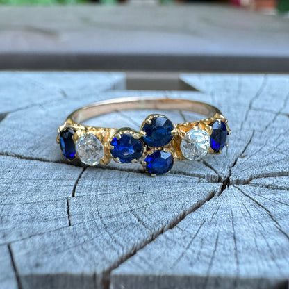 Vintage 22ct yellow gold mixed cut sapphire and old mine cut diamond half hoop ring
