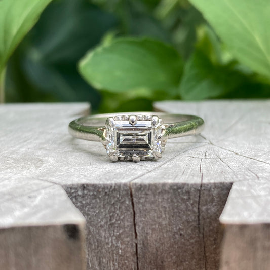 Vintage platinum 0.85ct emerald cut diamond solitaire ring