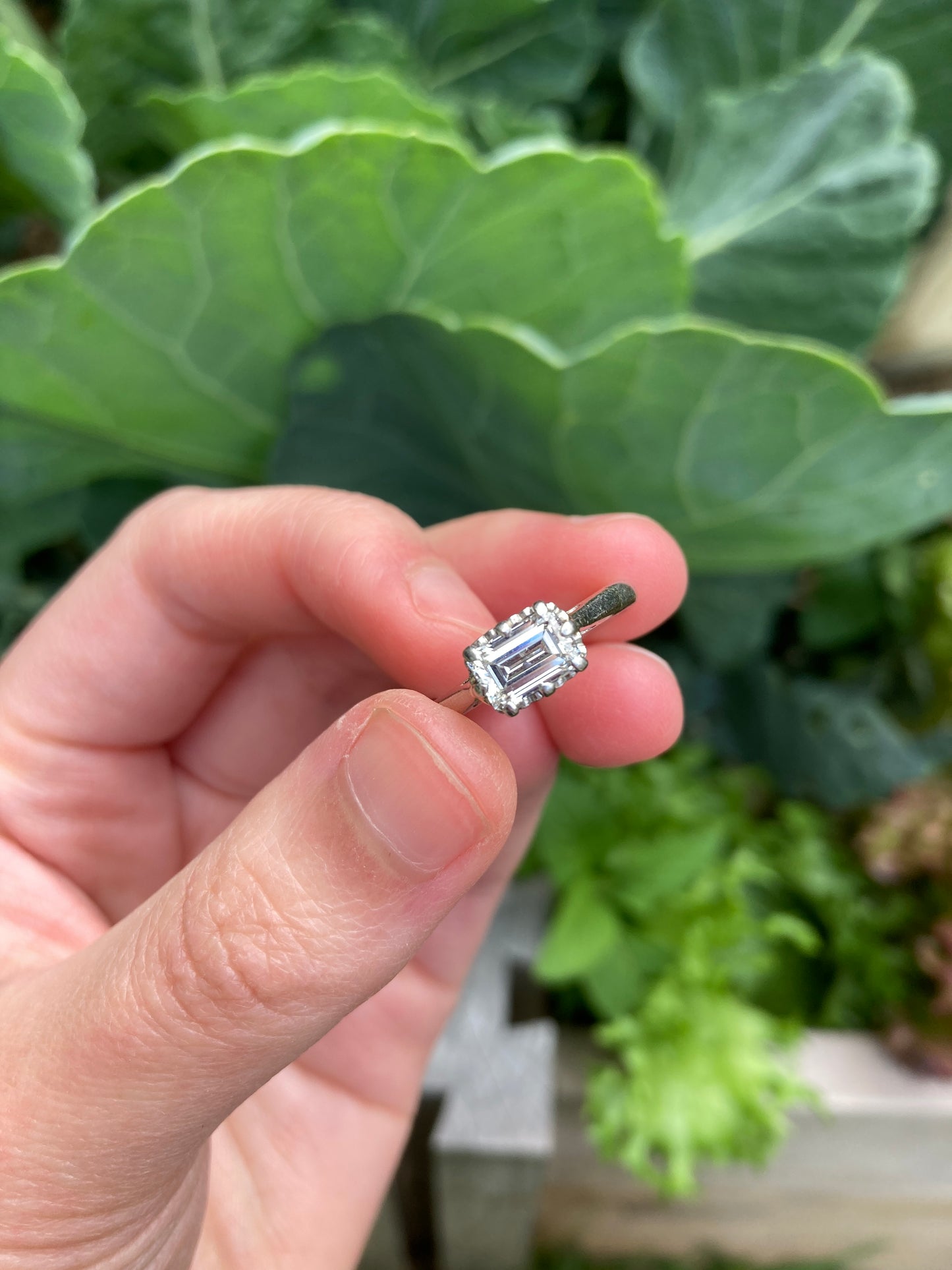 Vintage platinum 0.85ct emerald cut diamond solitaire ring