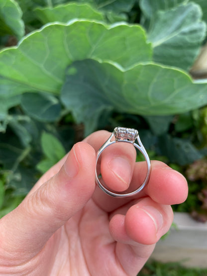 Vintage platinum 0.85ct emerald cut diamond solitaire ring
