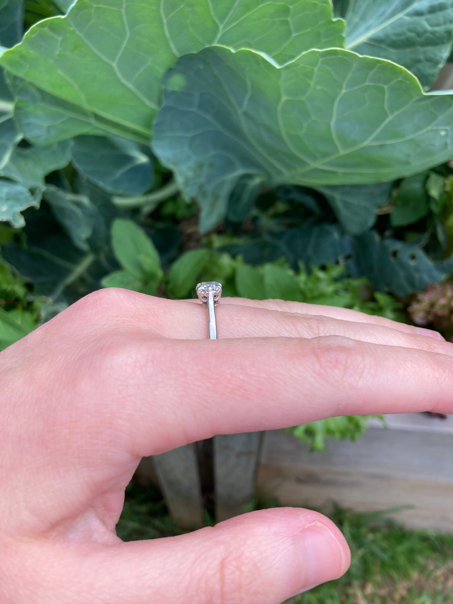 Vintage platinum 0.85ct emerald cut diamond solitaire ring