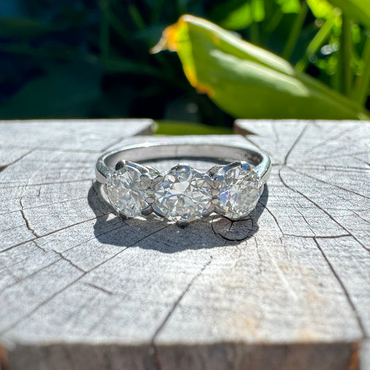 Vintage platinum three stone 1.15ct TCW old European cut diamond ring
