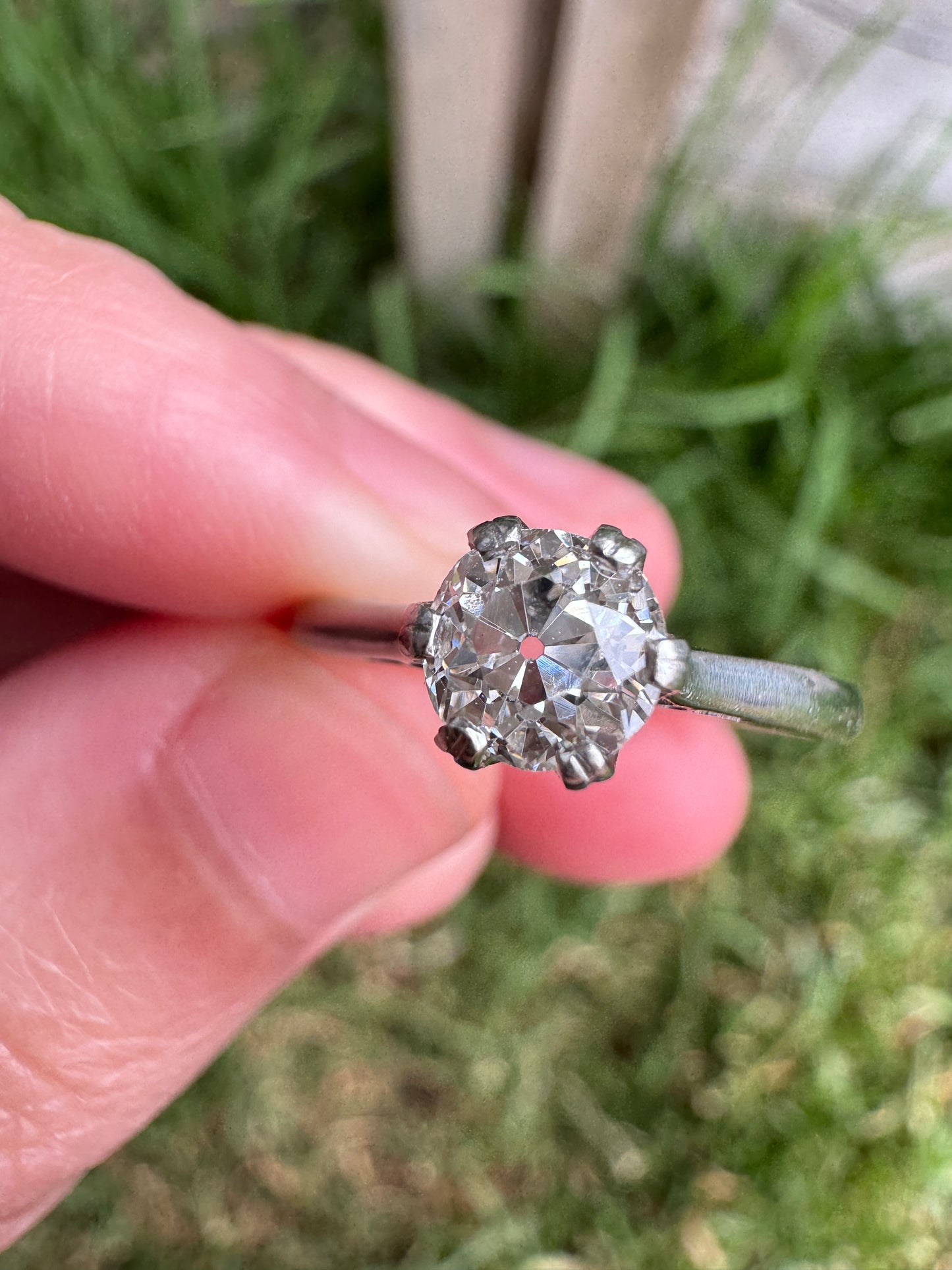 Vintage platinum 0.90ct old mine cut diamond solitaire ring
