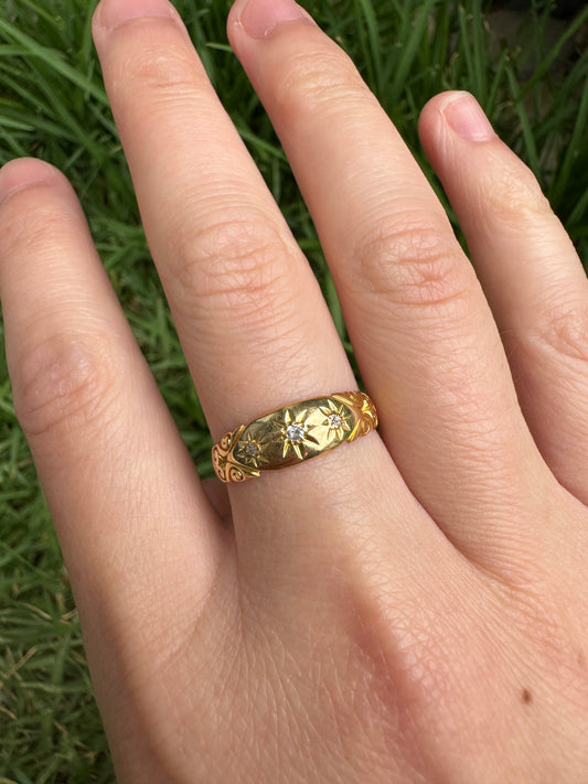 Antique 18ct yellow gold three stone old cut diamond gypsy ring with scrolled shoulders