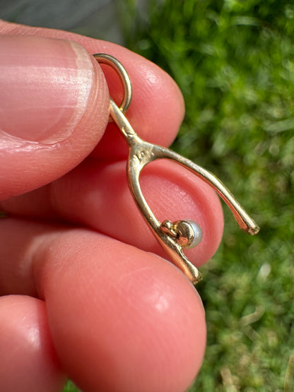 Vintage 14ct yellow gold and pearl wishbone charm
