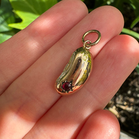 Vintage 9ct rose gold and garnet lucky bean charm