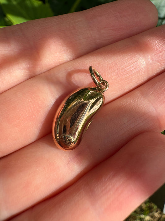Vintage 9ct rose gold and garnet lucky bean charm