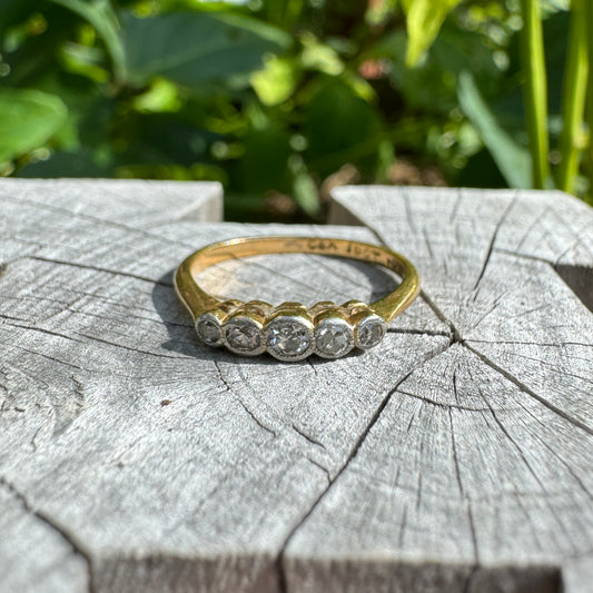 Vintage 18ct yellow gold and platinum five stone 0.25ct TCW bezel set single cut diamond ring