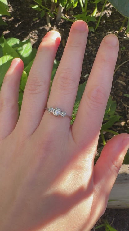 Vintage 18ct white gold and platinum three stone 0.16ct TCW old mine cut and old European cut diamond ring